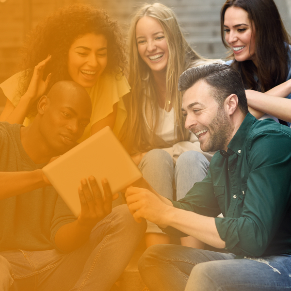 multi-ethnic-group-young-people-looking-tablet-computer.jpg